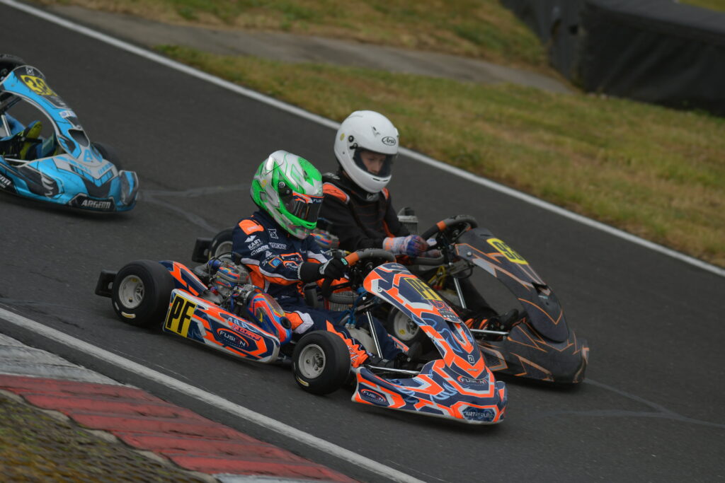 George Clark battling for position at TVKC PF International in dry conditions