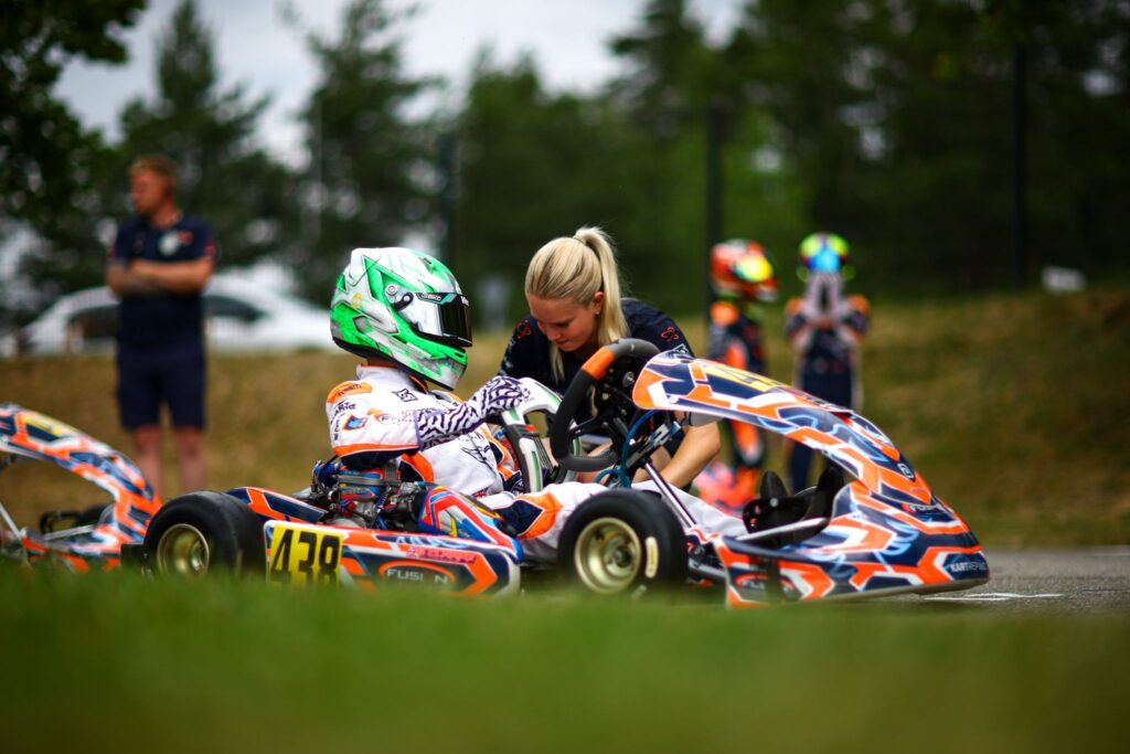 Fusion Motorsport team working on the kart at Euro Series Wackersdorf paddock